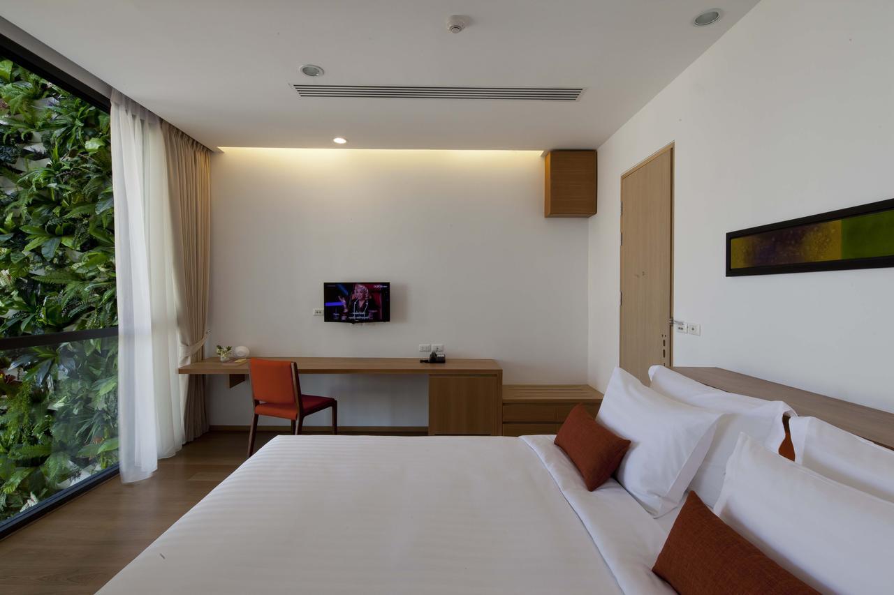 Eastin Tan Hotel Chiang Mai Quarto foto